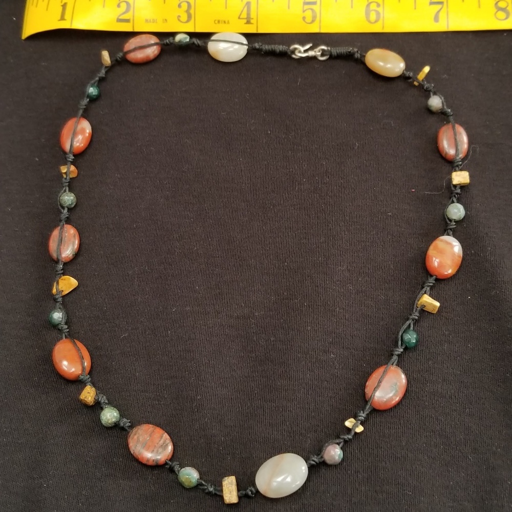 black chord and stone necklace
